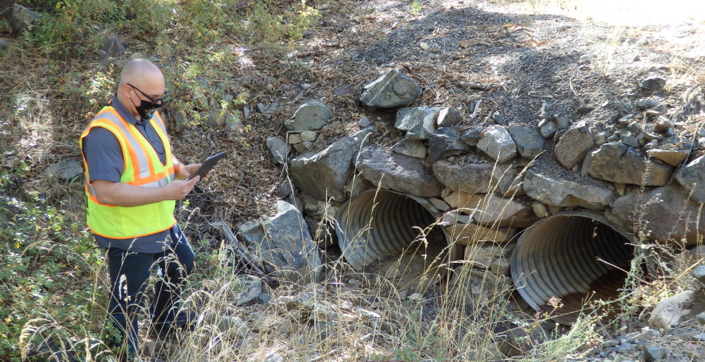 Tony in the field, using 2NFORM on his mobile device