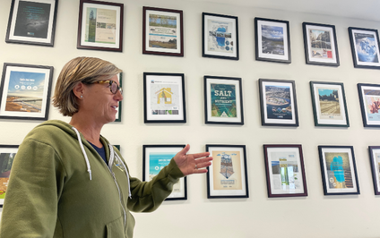2NDNATURE CEO Nicole Beck in front of the wall of publications