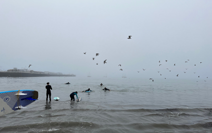 The 2NDNATURE team surfing together at All Hands 2022