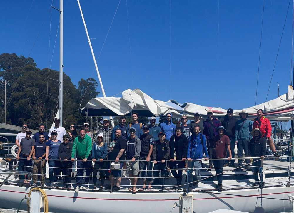 The 2NDNATURE team at All Hands 2022 - team picture on a sailboat